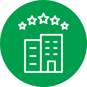 Icon of two buildings and five stars inside of a green circle